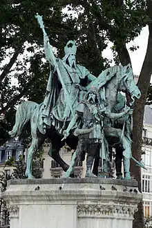 Charlemagne holding the scepter in the bronze group Charlemagne et ses Leudes by the Rochet brothers, Paris , 1878