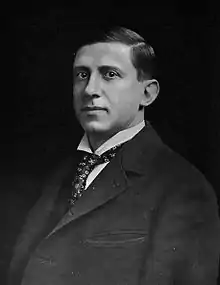 Formal half-length portrait of a man of about 40. He is wearing a dark jacket, white shirt, and tie.