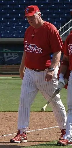 Charlie Manuel, a middle-aged man, in uniform on the field