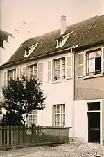 Sepia photograph of a townhouse.