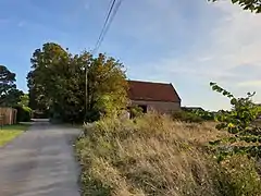 Approach to the barn from The Warren