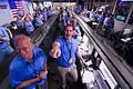 Engineers at NASA's Jet Propulsion Laboratory celebrate the landing.