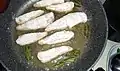 Frying fillets with butter and sage