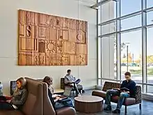 image of students sitting in lobby of Chemeketa Yamhill Velley Campus