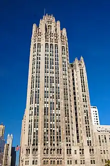 A gothic tower with a "crown" of ornament at its top