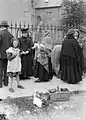 Woman wearing a Galway Shawl in Galway. About 1910