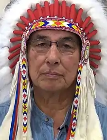 Littlechild wearing his honorary chief headdress