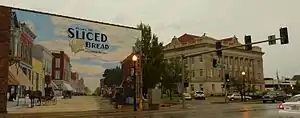 Livingston County Courthouse with mural depicting the community being the home of sliced bread.  The district around the courthouse is on the National Register of Historic Places.