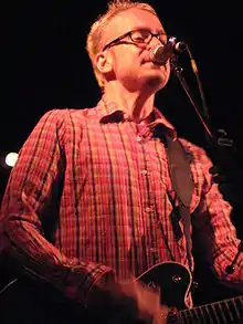 Collingwood performing live on stage in 2007.