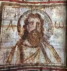 Mural painting from the catacomb of Commodilla. Bust of Christ, (one of the first bearded images of Christ) with alpha and omega. Late 4th century