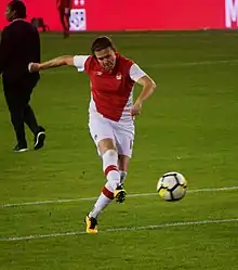 Sinclair warms up before an international friendly in November 2017