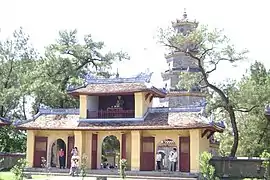 The gate of Thiên Mụ Pagoda and Phước duyên Tower is seen from the inside.