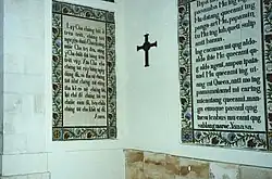 Vietnamese and Kapampangan versions of the Lord's Prayer on a wall