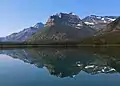 Citadel Peaks reflected in Waterton Lake.Kootenai Peak (left), Porcupine Ridge (right).