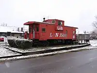 The City of Helena Welcome Center is housed in a Louisville & Nashville Railroad caboose in Old Town next to the CSX S&NA Subdivision tracks.