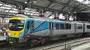 The current livery carried by the class, seen at Liverpool Lime Street in 2017.