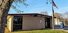 one-story brick building with sign reading "United States Post Office, Clear Lake, Minnesota 55319"