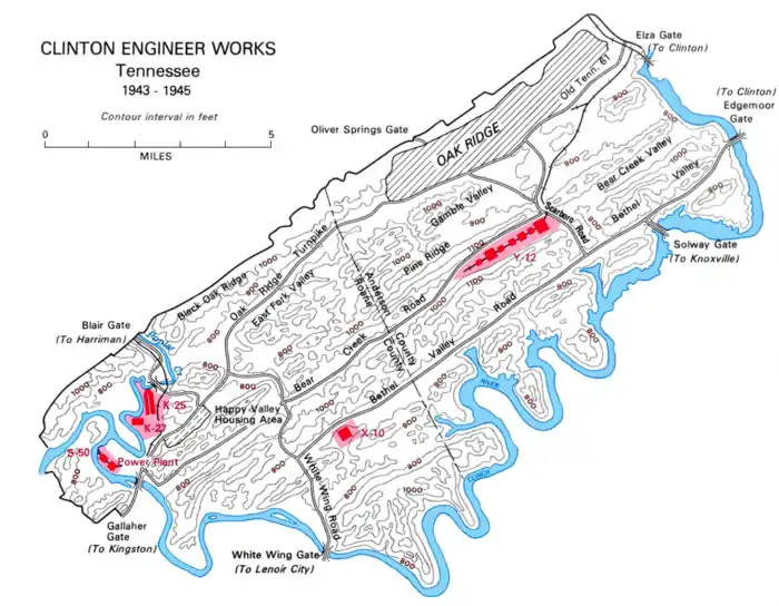 Contour map of the Oak Ridge area. There is a river to the south, while the township is in the north.