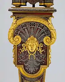 Baroque mascaron on the pedestal of a clock, designed and made by André Charles Boulle, c.1690, gilt wood, Metropolitan Museum of Art, NYC