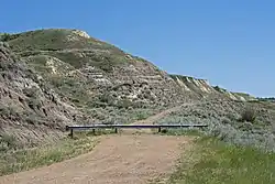 Closed road in badlands in Wayne