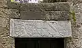 A lintel in Ippoton street in Rhodes, featuring the coat of arms of the Knights of Rhodes (in the center), flanked by the coats of arms of Grand Masters Hélion de Villeneuve (r. 1319–1346) and Dieudonné de Gozon (r. 1346–1353), again flanked by the coats of arms of  England and of king Edward III of England, c. 1350.