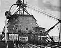 Trains being loaded by a coal dredge in the open cut.