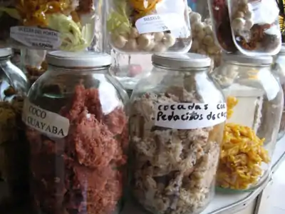 Colombian cocadas in jars.