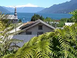 Reloncaví Estuary with Yate volcano in the background and the town of Cochamó in the foreground.