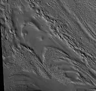 Coloe Fossae Pits, as seen by HiRISE.  Pits are believed to result from escaping water. Coloe Fossae is in the Ismenius Lacus quadrangle.