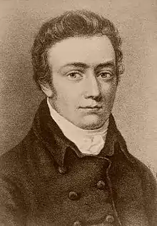 Head and shoulders etching of a young man in a high collar and buttoned coat. He is looking at the viewer.