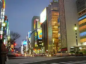 The Sony Building and intersection at dusk. The Sony building was demolished in 2017, and the new Sony building is scheduled for completion and opening in fall 2022.[needs update]