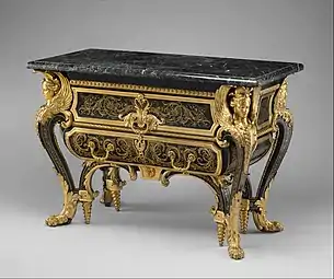 Commode; by André Charles Boulle; c.1710–1732; walnut veneered with ebony and marquetry of engraved brass and tortoiseshell, gilt-bronze mounts, antique marble top; 87.6 x 128.3 x 62.9 cm; Metropolitan Museum of Art (New York City)