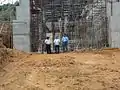 Construction of Forebay (Chief Executive Officer; Aruna Dheerasinghe with one of the project consultants and engineering staff members)