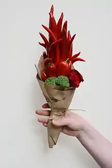 Red long bouquet with chili and broccoli