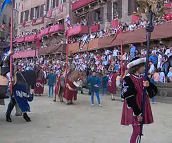 Representatives of the Abolished Contrade with removed helmets