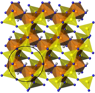 Aluminosilicate layer T-O'-T. The black circle indicates six-membered rings.