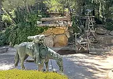 At the shallow basin to the Maynard's Mountain waterfall, Paso Robles Event Center displays a thousand-pound, clay-sculpted bronze statue of a horseback cowboy seeking a drink, entitled "Cool Water."