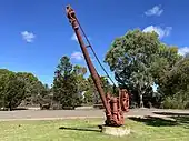 Railway crane relocated to the adjacent highway rest stop.