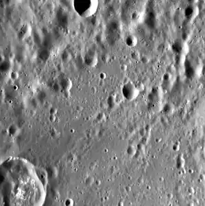 Unnamed crater in northwestern Homer which contains hollows and has dark ejecta.