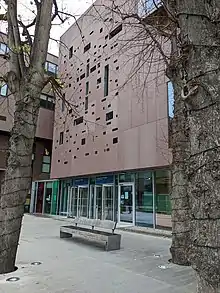 Library building from front entrance on a grey day.