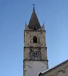 The bell tower of the church in Crots