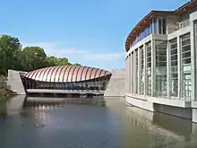 Image 32A wing of Crystal Bridges spans its namesake spring, April 2012 (from Culture of Arkansas)