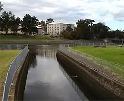 Junction of Cooks River and Cup and Saucer Creek, with old sugarmill in the background