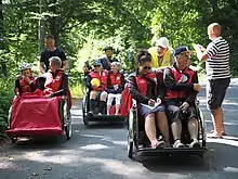 A group of "Cycling Without Age" trishaws during the Øresund Tour 2016 taking a rest