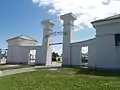 Entrance to the Cypress Grove Cemetery, with gates said to be suggestive of triumphal passage from one world to the next