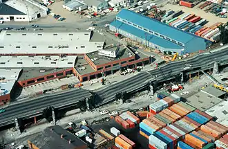 Portion of the collapsed Cypress Street Viaduct after the Loma Prieta earthquake; the collapse resulted in 42 fatalities.