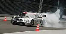 Mika Häkkinen burnouts Mercedes-Benz AMG C-Class W203 DTM during 2006 Stars & Cars