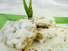 In form of dahi vada, with yogurt