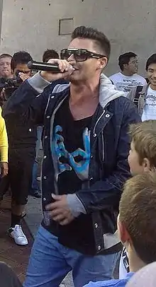 Rumble performing at a free concert at the Sky Tower Auckland City, in March 2010.