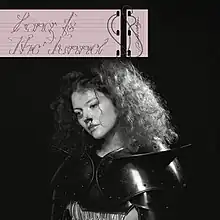 A black-and-white photo of Anna Beckerman wearing armor